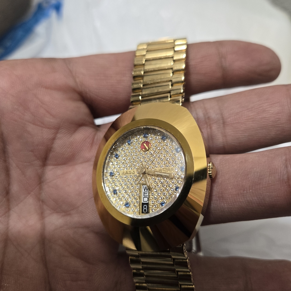 Rado Gold Watch with Crystal Dial